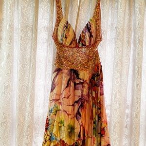 Multicoloured floral evening dress with beaded details.